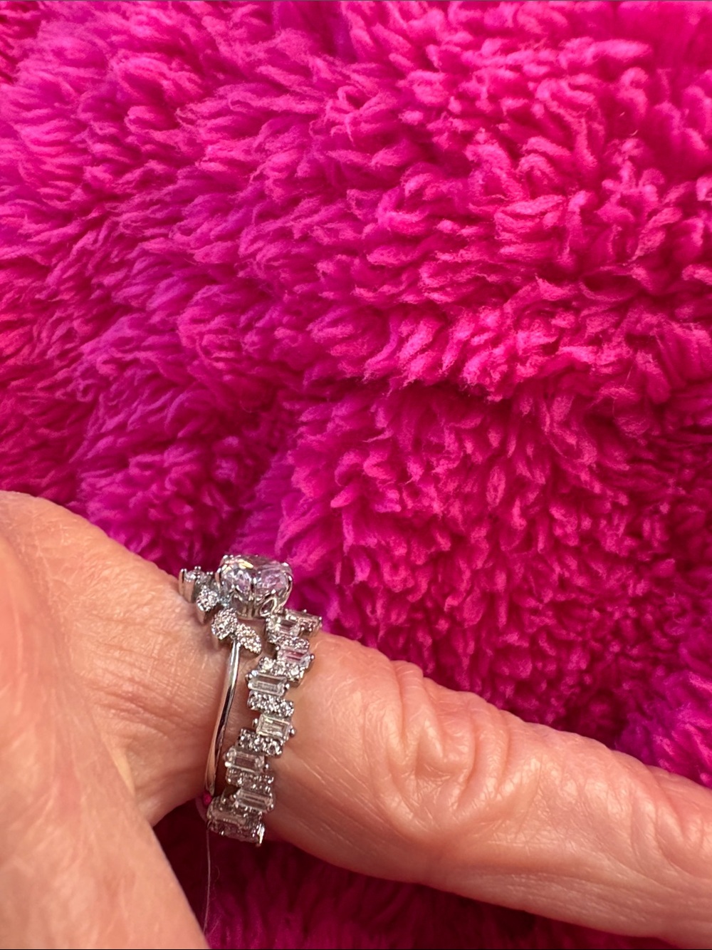 Silver Rings with white Cubic Zirconia stones. Both fit well together
So Pretty! - Picture 8 of 12